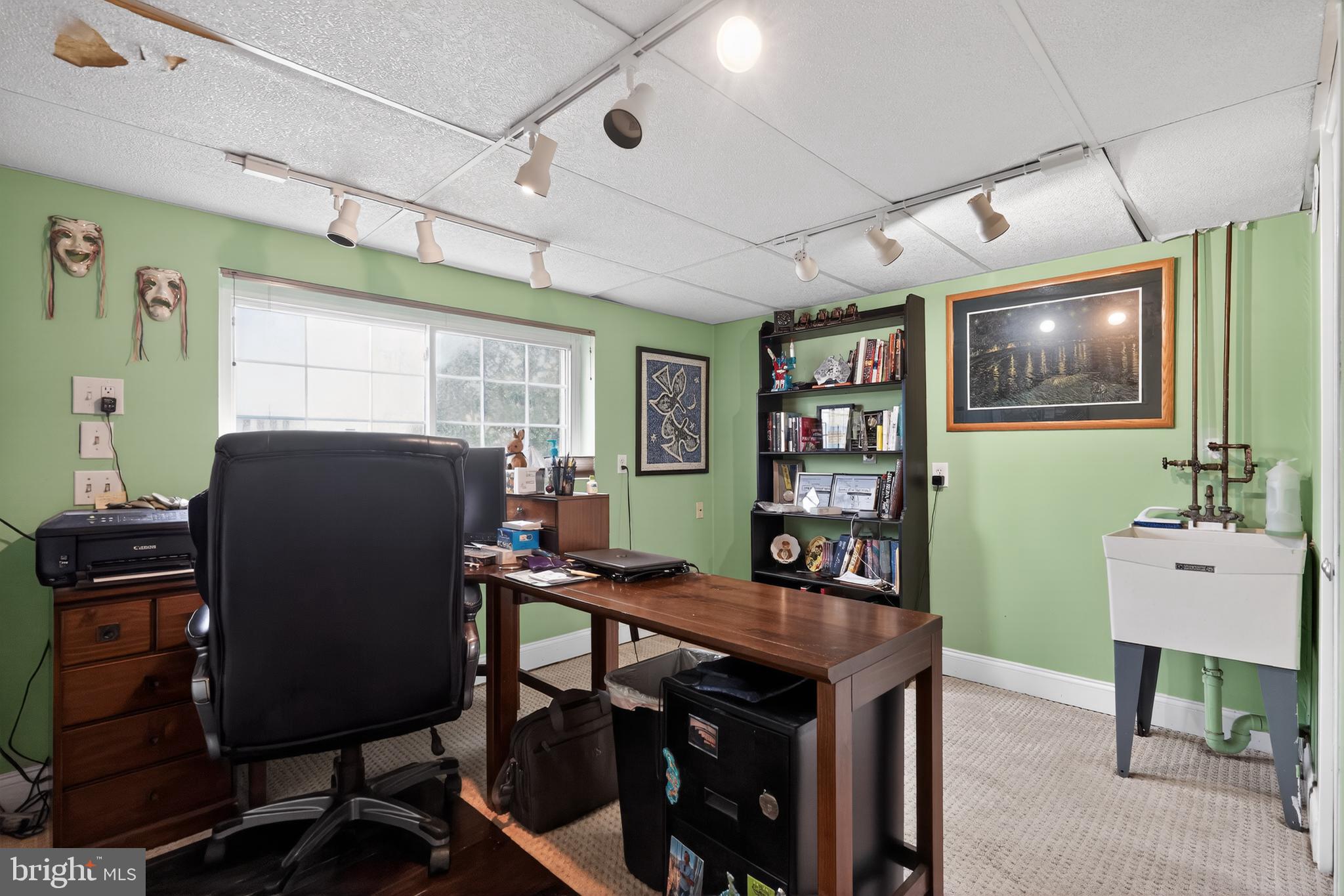 1001 Rydal Road Cherry Hill, NJ 08034 - Photo 18 of 47 a view of a workspace with furniture and a potted plant