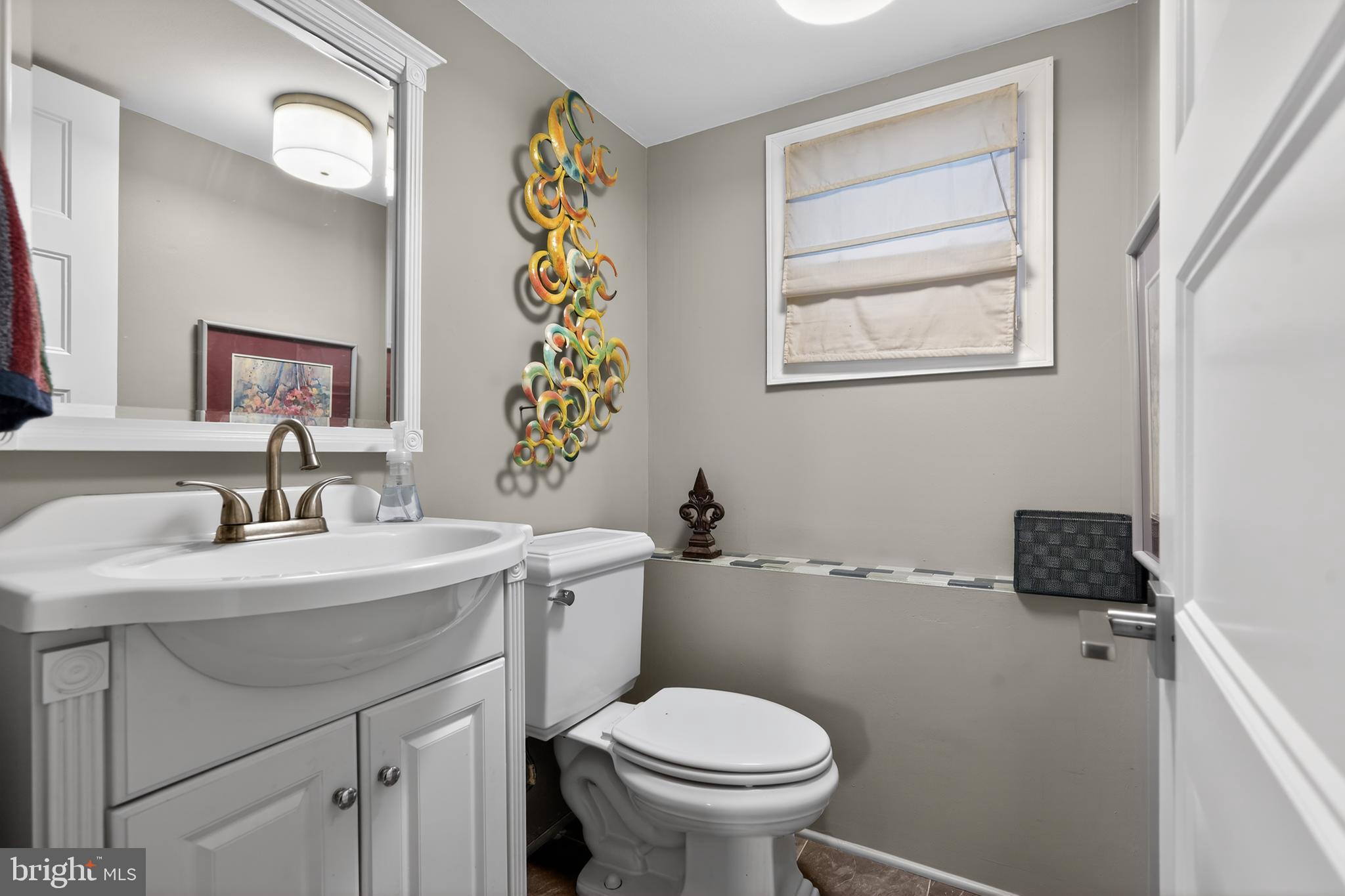 1001 Rydal Road Cherry Hill, NJ 08034 - Photo 20 of 47 a bathroom with a toilet sink and mirror
