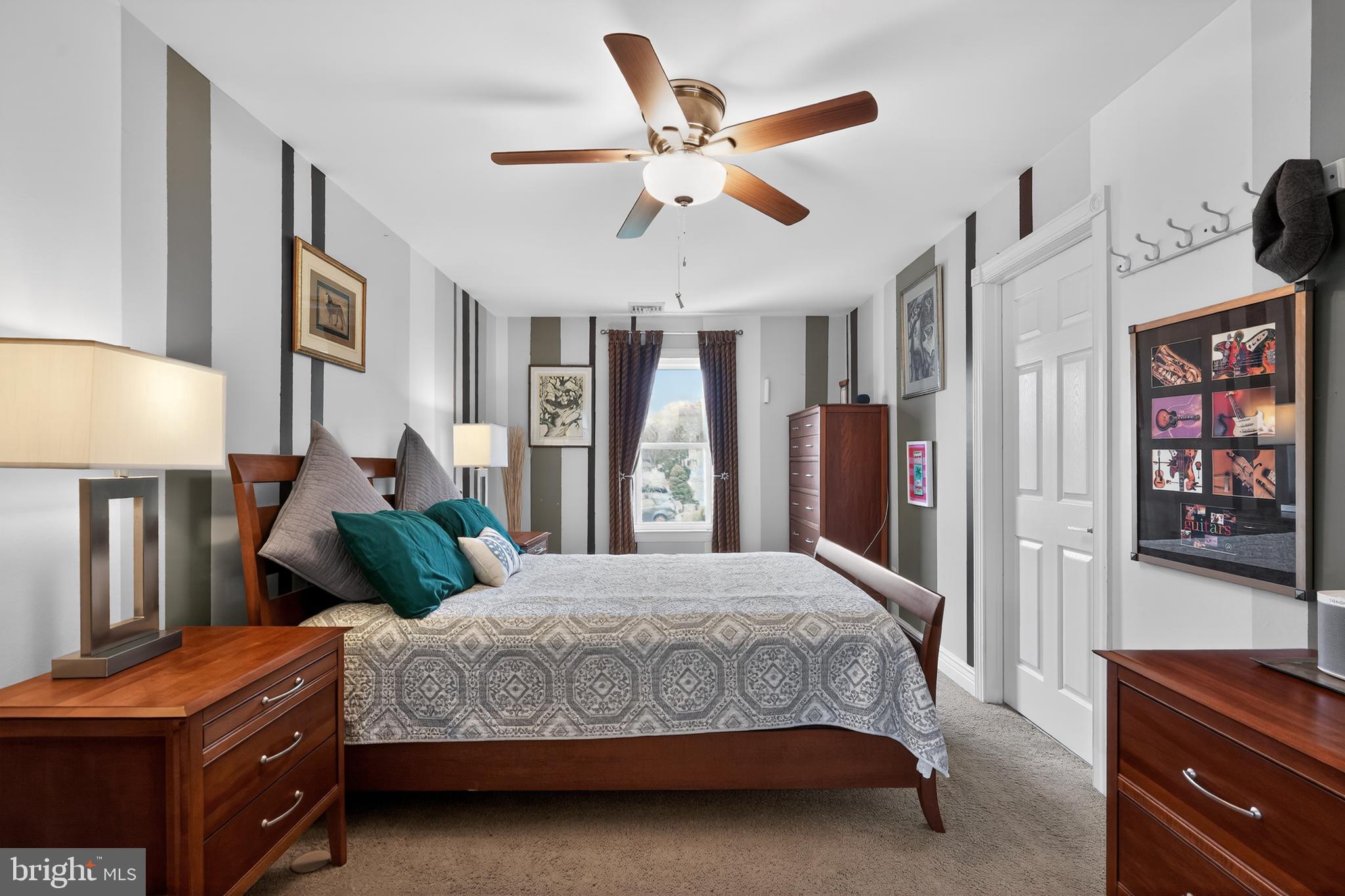 1001 Rydal Road Cherry Hill, NJ 08034 - Photo 22 of 47 a bedroom with a bed wooden floor and window