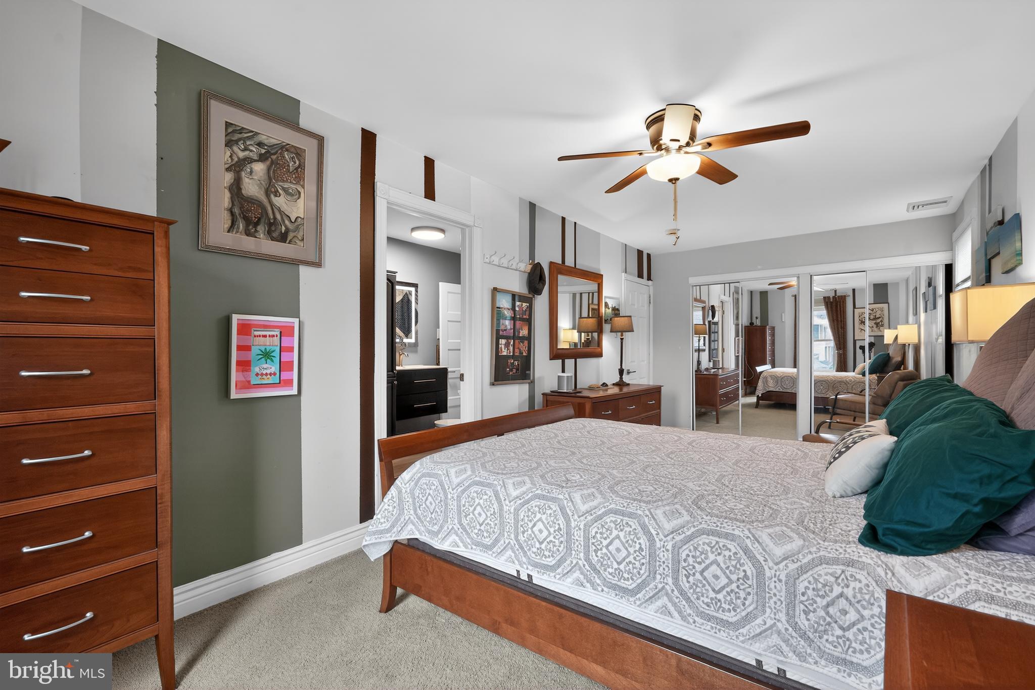 1001 Rydal Road Cherry Hill, NJ 08034 - Photo 24 of 47 a bedroom with a large bed and a chandelier