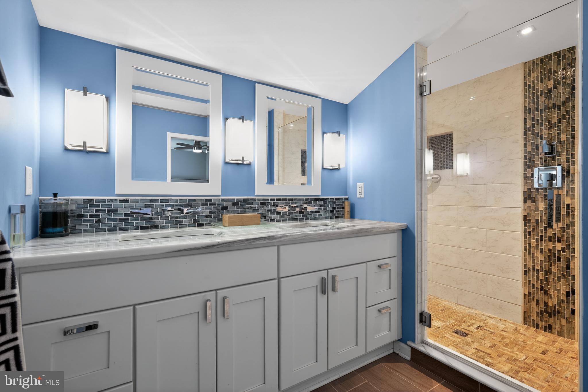 1001 Rydal Road Cherry Hill, NJ 08034 - Photo 27 of 47 a bathroom with a sink and a mirror