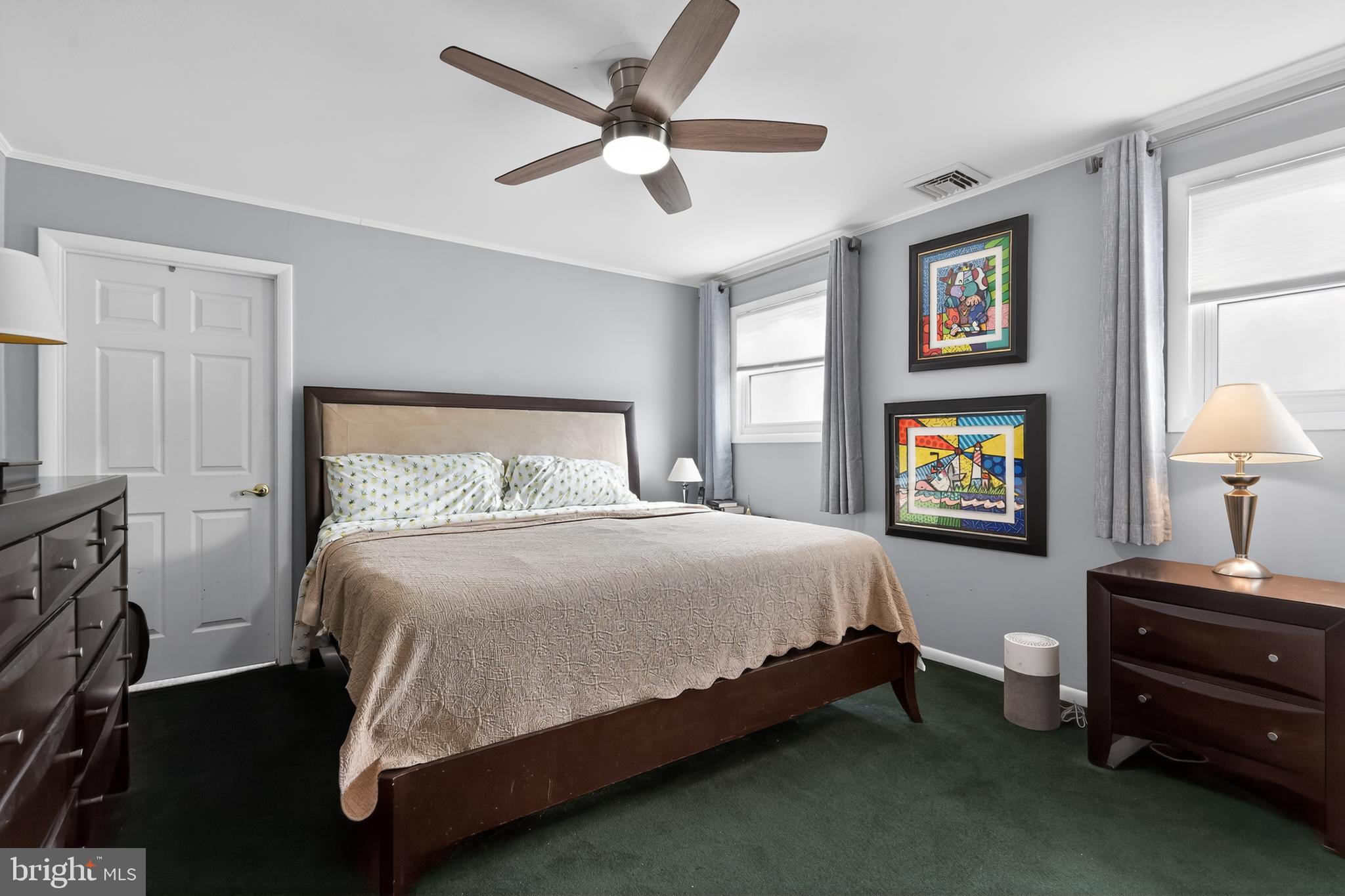1001 Rydal Road Cherry Hill, NJ 08034 - Photo 28 of 47 a bedroom with a bed and a tv on the dresser