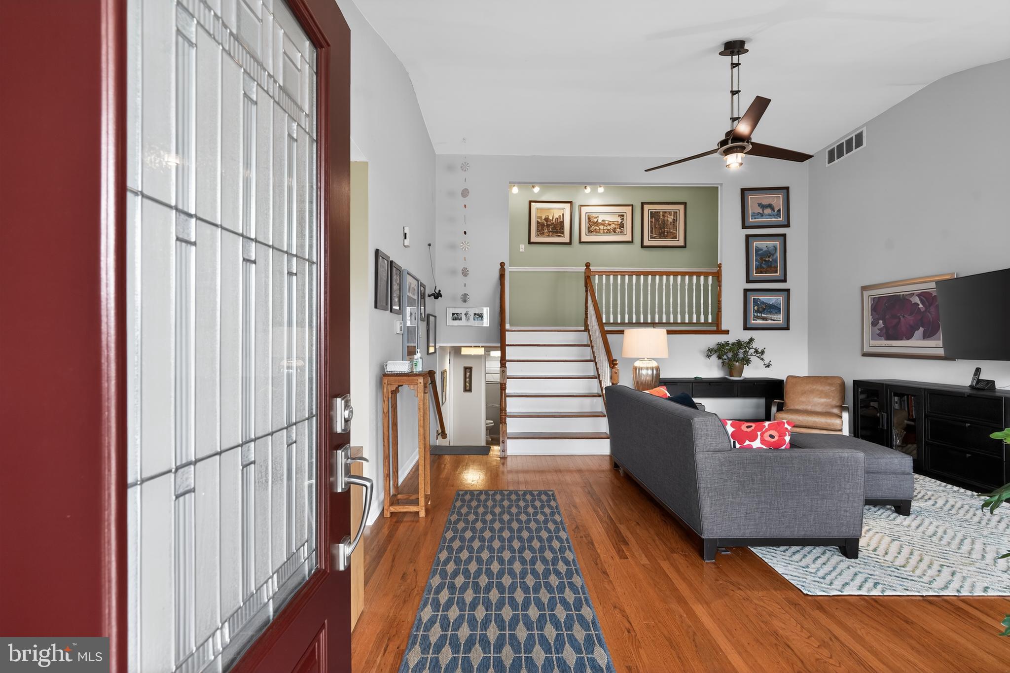 1001 Rydal Road Cherry Hill, NJ 08034 - Photo 4 of 47 a living room with furniture and a fireplace