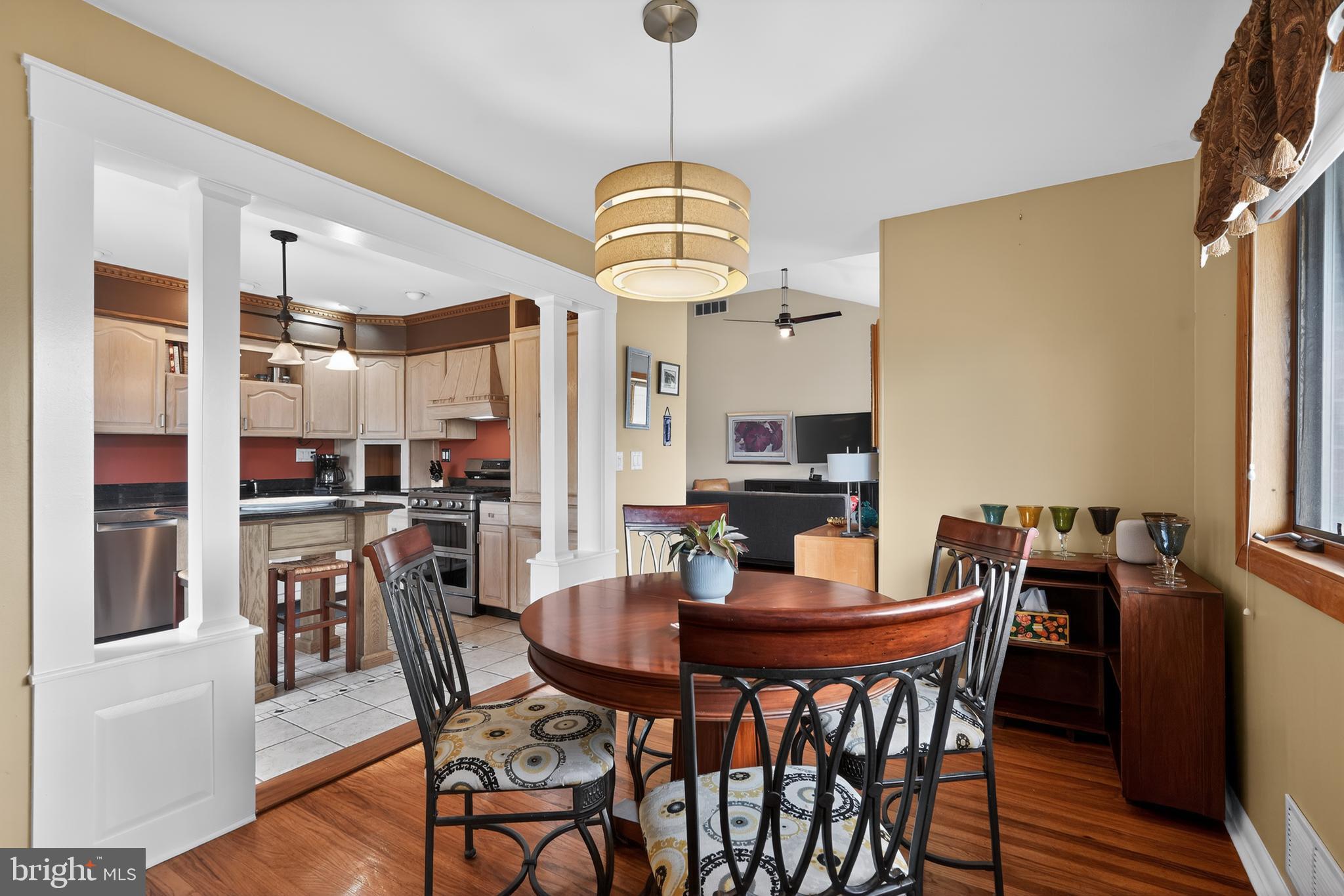 1001 Rydal Road Cherry Hill, NJ 08034 - Photo 9 of 47 a dining room with furniture and wooden floor