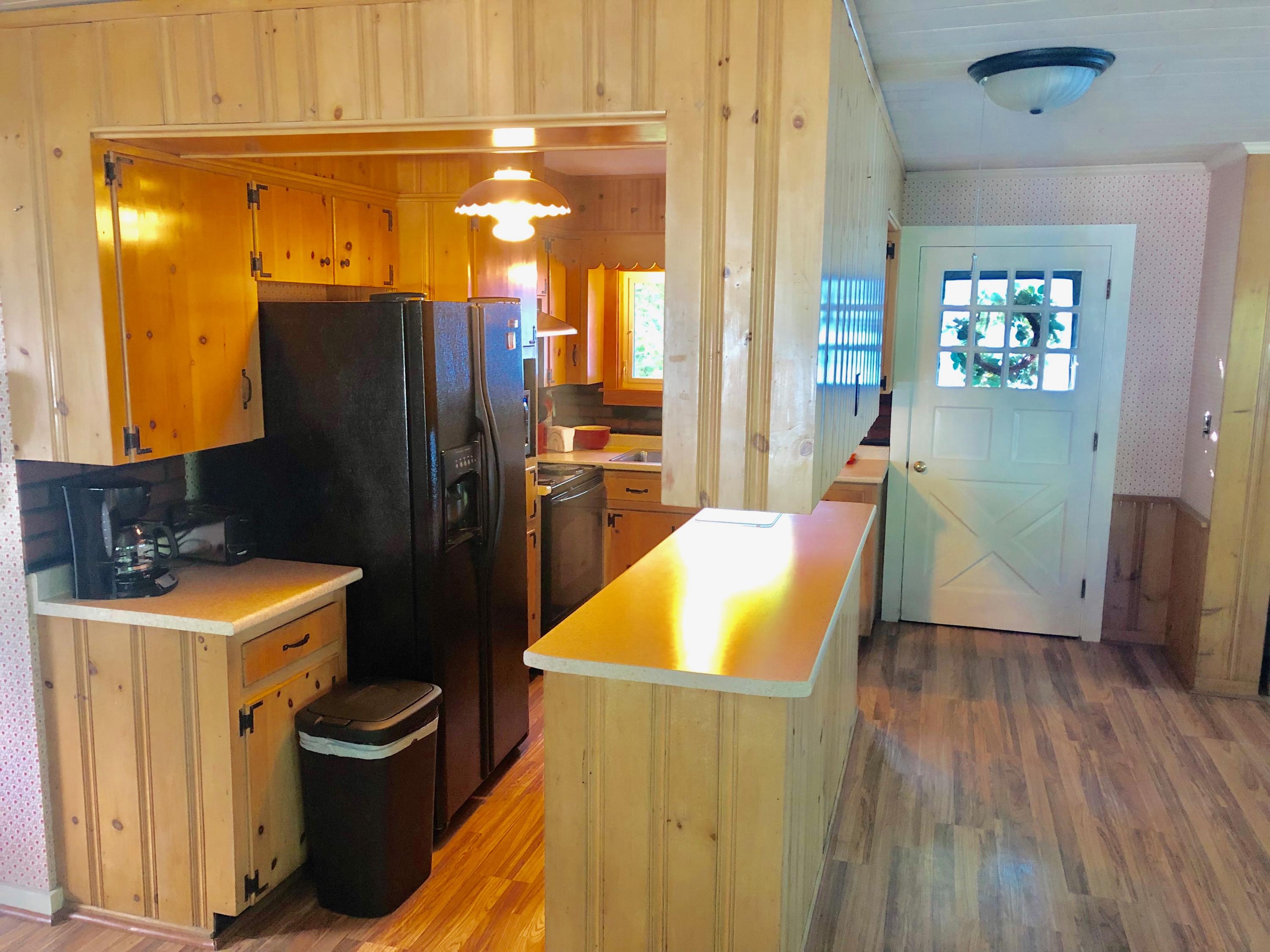 758 Newbury Neck Road Surry, ME 04684 - Photo 6 of 24 Kitchen and front entryway