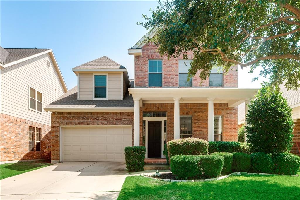 2855 Coteau Way Dallas, TX 75227 - Photo 1 of 1 front view of a house with a yard