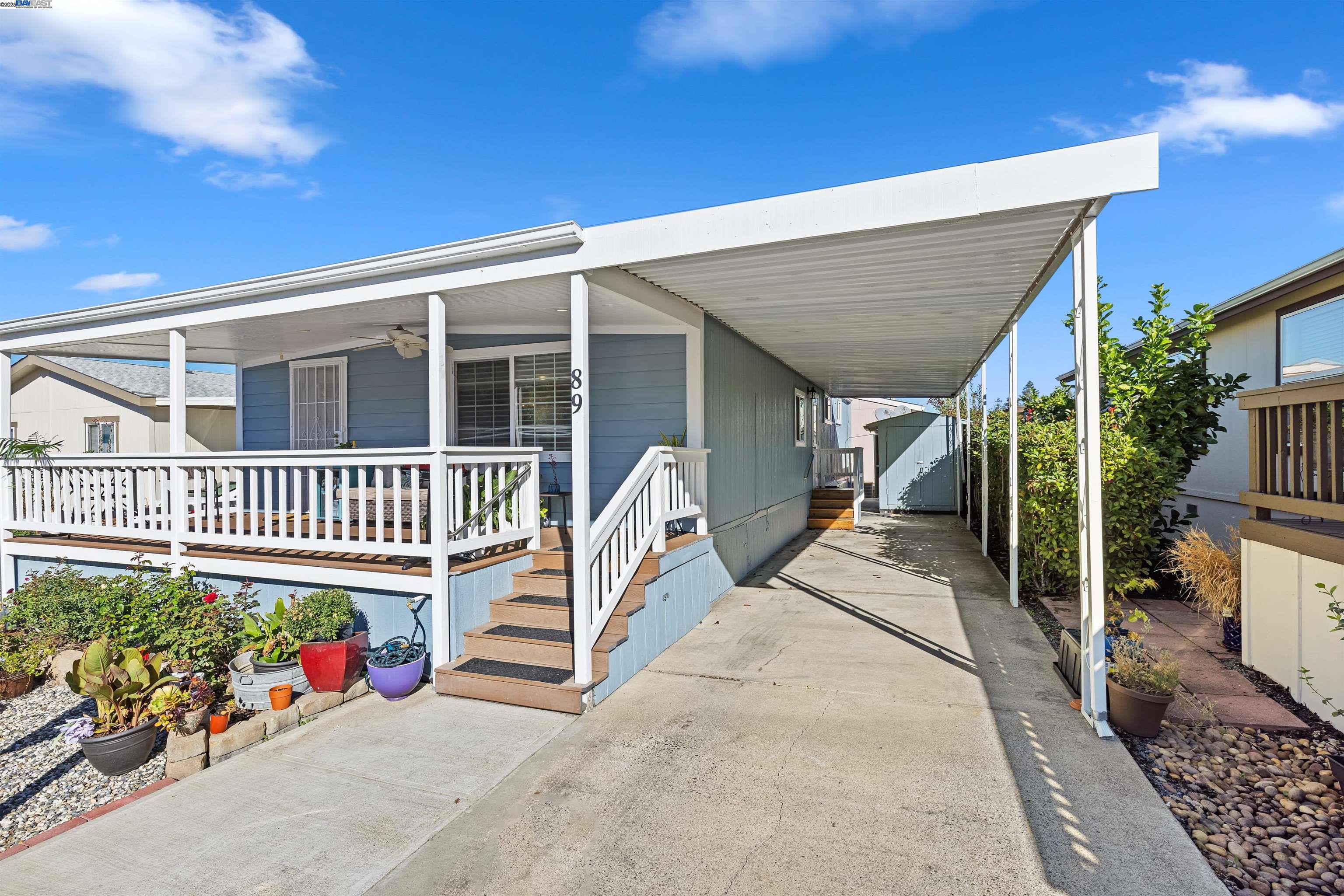 3263 Vineyard Avenue, Unit 89 Pleasanton, CA 94566 - Photo 1 of 41 a house view with a garden space
