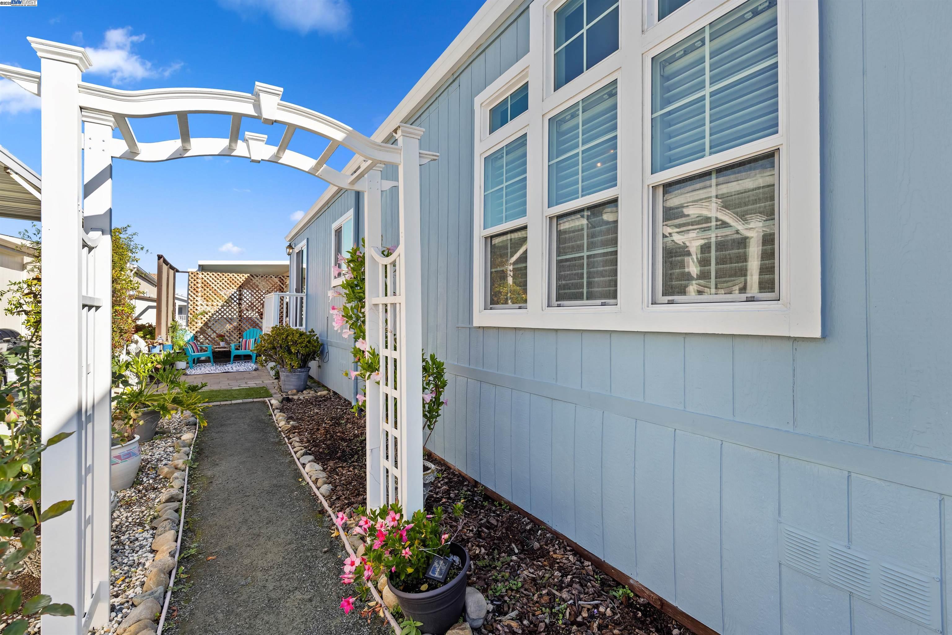 3263 Vineyard Avenue, Unit 89 Pleasanton, CA 94566 - Photo 11 of 41 a view of a house and a entryway