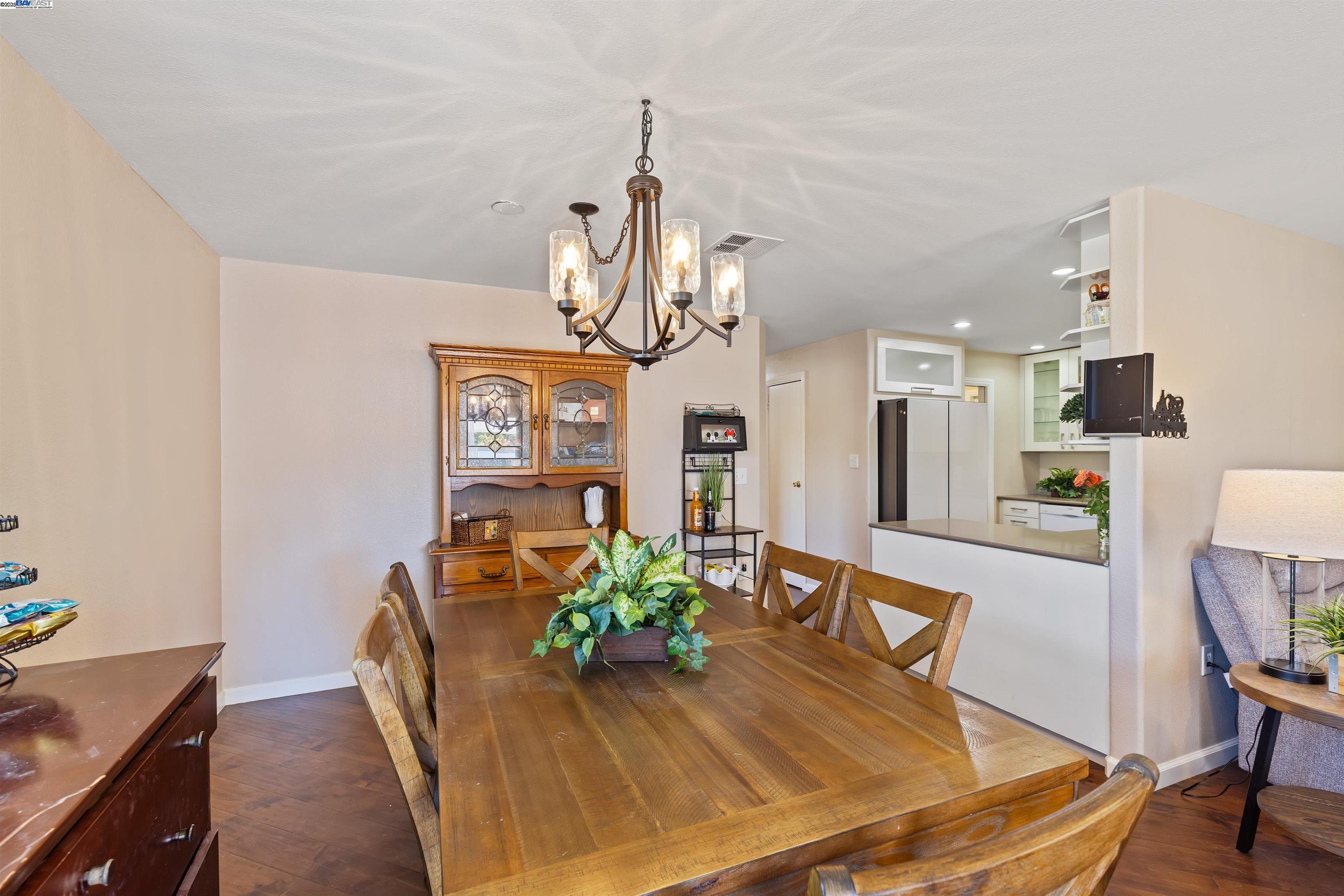 3263 Vineyard Avenue, Unit 89 Pleasanton, CA 94566 - Photo 16 of 41 a view of a dining room with furniture