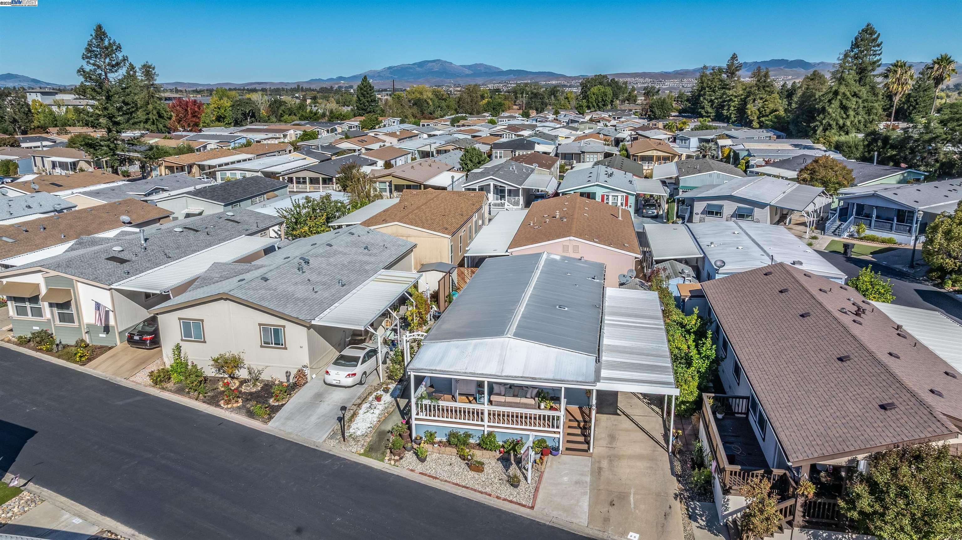 3263 Vineyard Avenue, Unit 89 Pleasanton, CA 94566 - Photo 30 of 41 an aerial view of residential houses with outdoor space