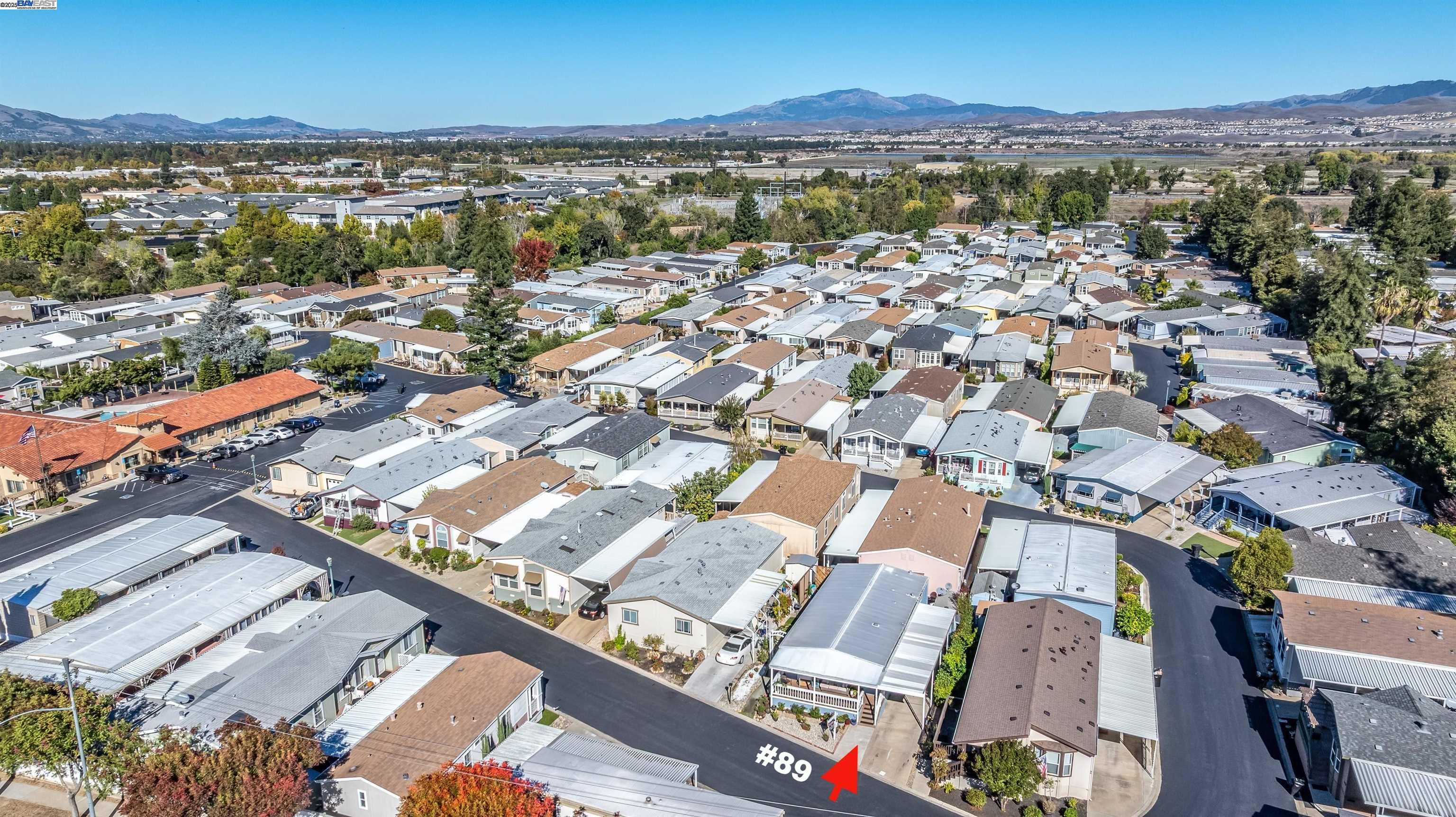 3263 Vineyard Avenue, Unit 89 Pleasanton, CA 94566 - Photo 31 of 41 an aerial view of residential building with outdoor space
