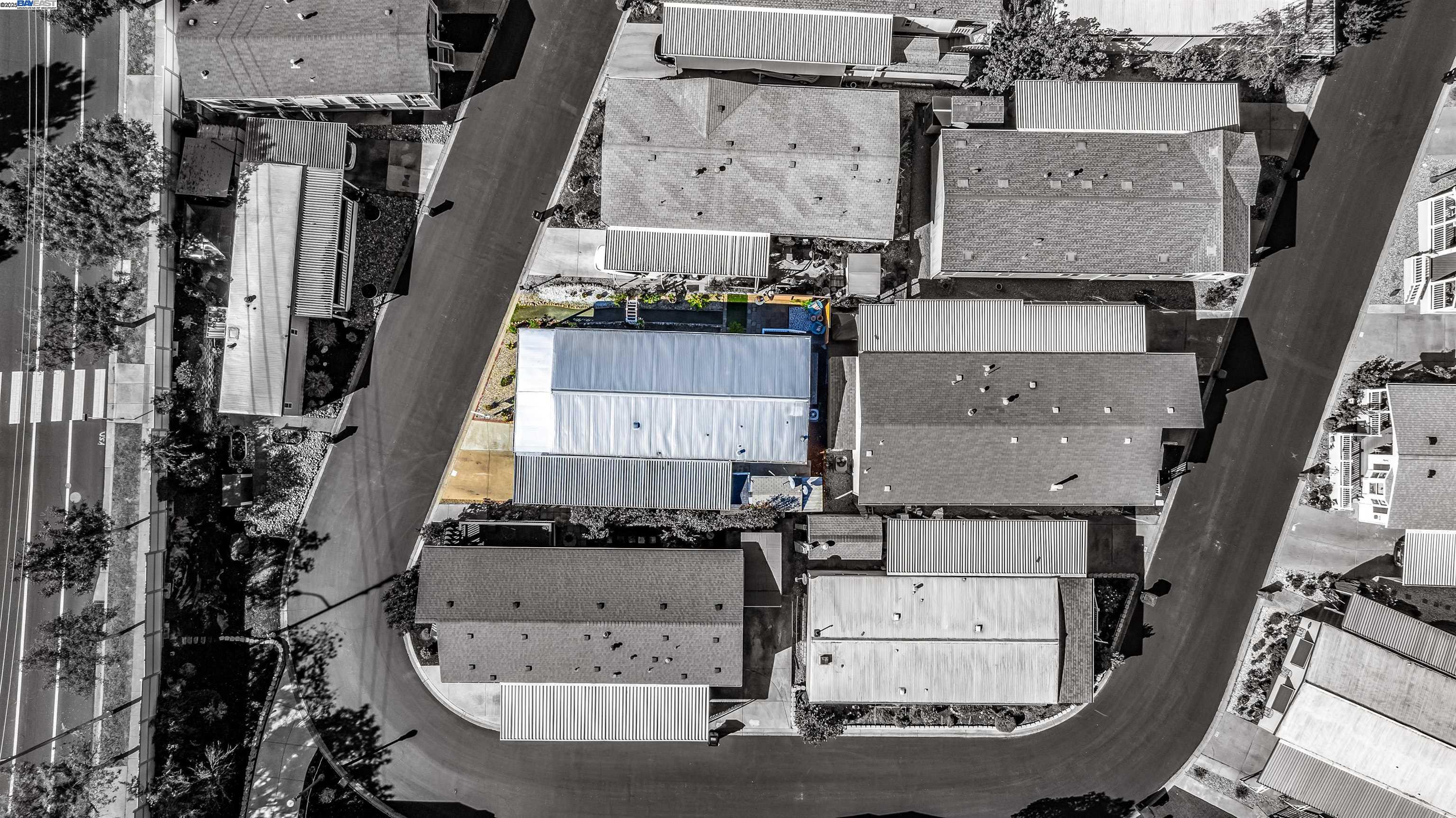 3263 Vineyard Avenue, Unit 89 Pleasanton, CA 94566 - Photo 34 of 41 an aerial view of residential houses with outdoor space
