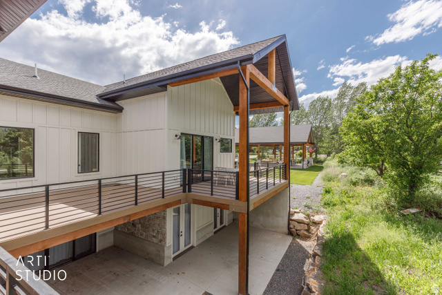 1188 South Old Trappers Loop Road Huntsville, UT 84317 - Photo 68 of 92 Spacious elevated deck with horizontal metal railings