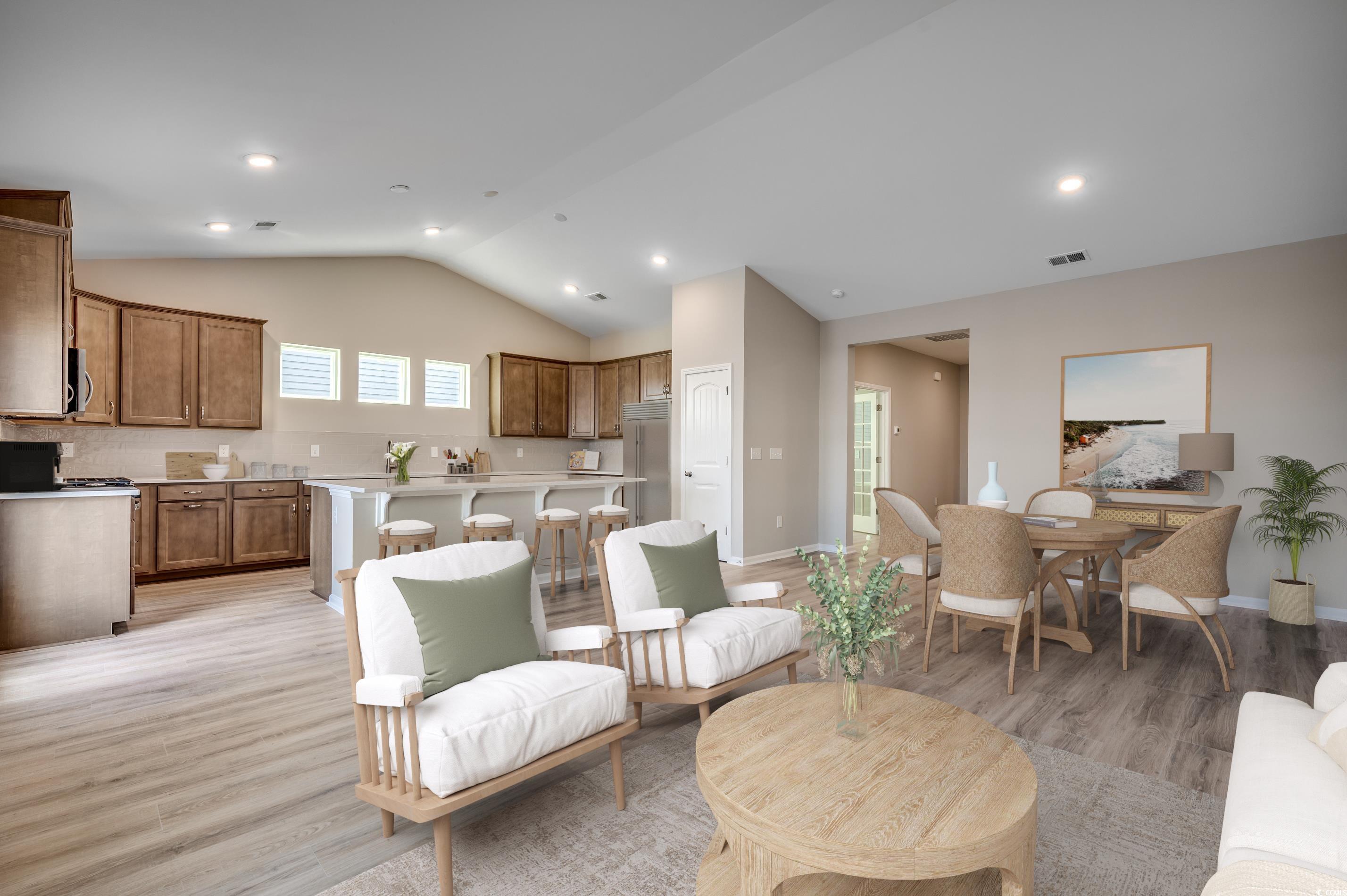 129 Buckingham Drive Loris, SC 29569 - Photo 4 of 8 Living area with vaulted ceiling, light wood-style floors, and recessed lighting
