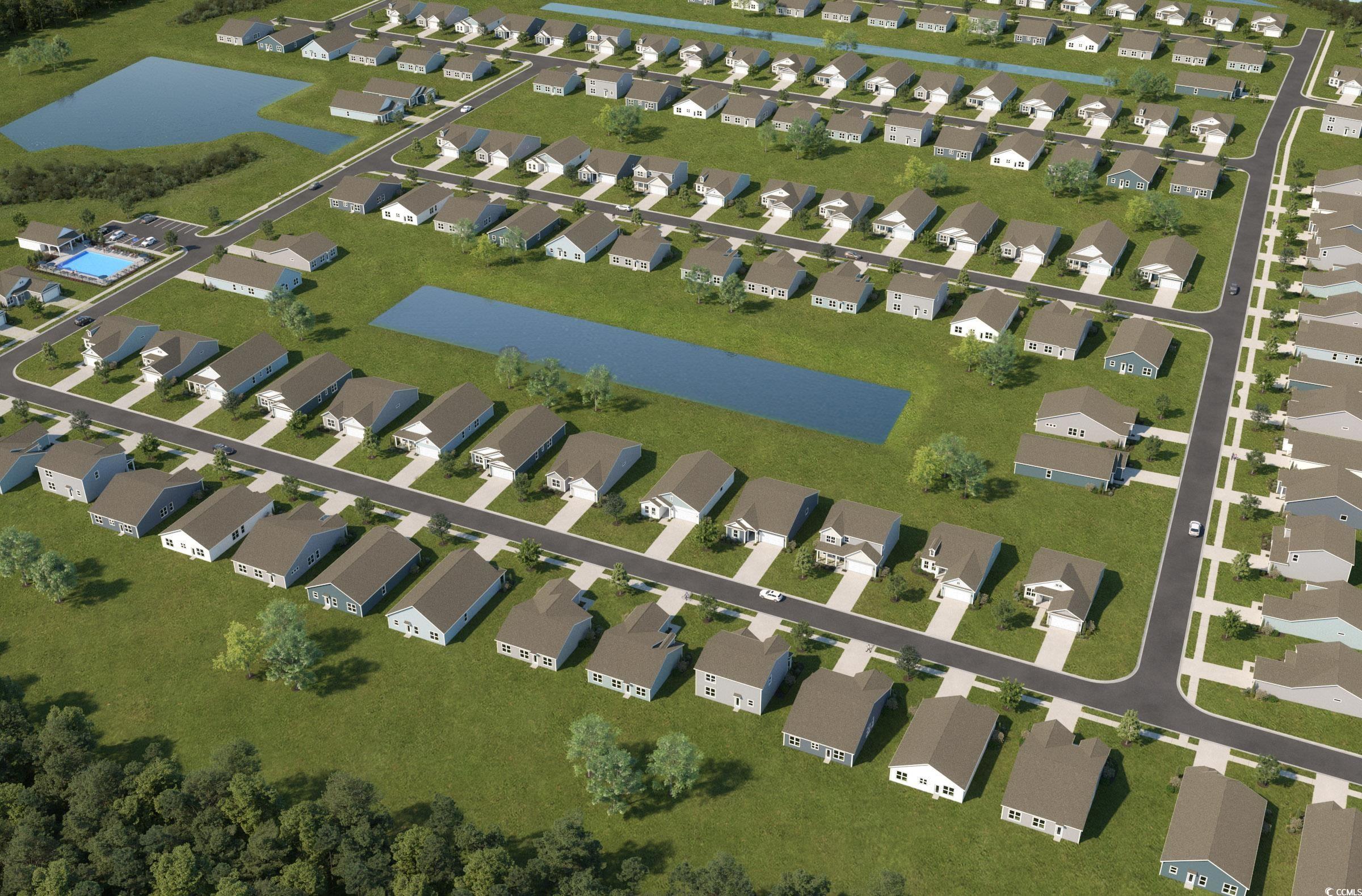 129 Buckingham Drive Loris, SC 29569 - Photo 7 of 8 Aerial perspective of suburban area featuring a large body of water