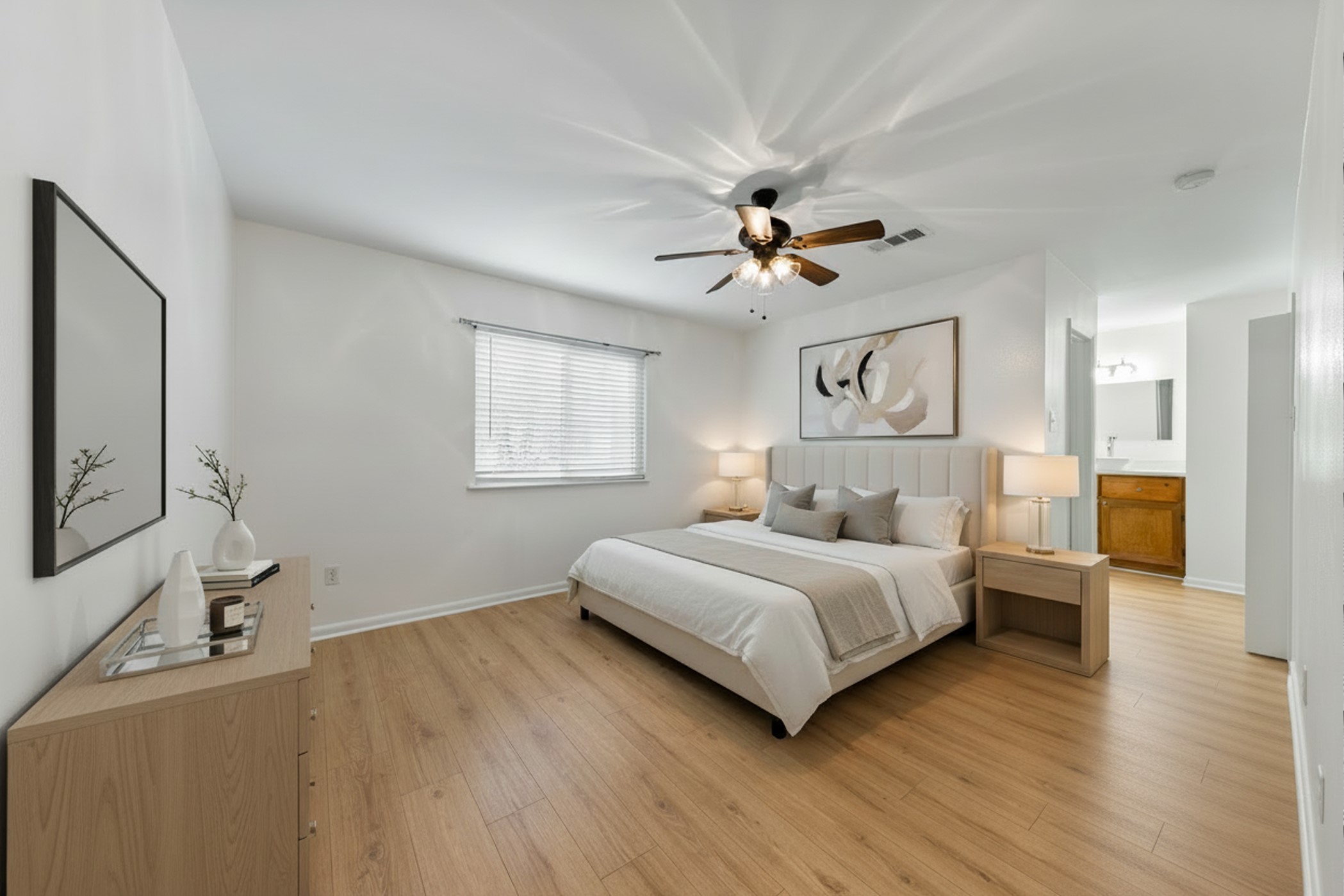 Nice bedroom with elegant furnishings and serene decor.   Rental home conveniently located near Downtown Houston and the Medical Center. Virtual staging