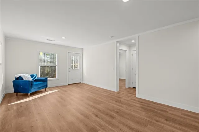 a view of an empty room and window