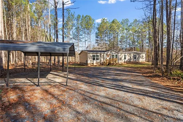 a view of a chairs and bench on the floor
