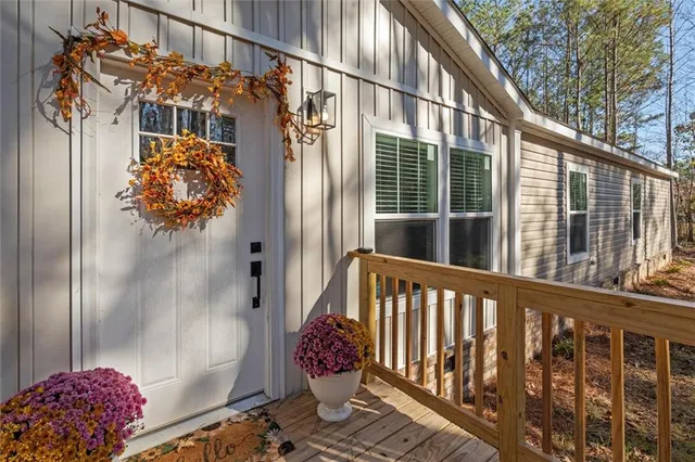 a balcony view with a potted plant