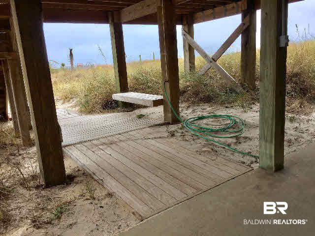 8749 Pompano Way Gulf Shores, AL 36542 - Photo 40 of 45 hose and shower the kids free of sand....