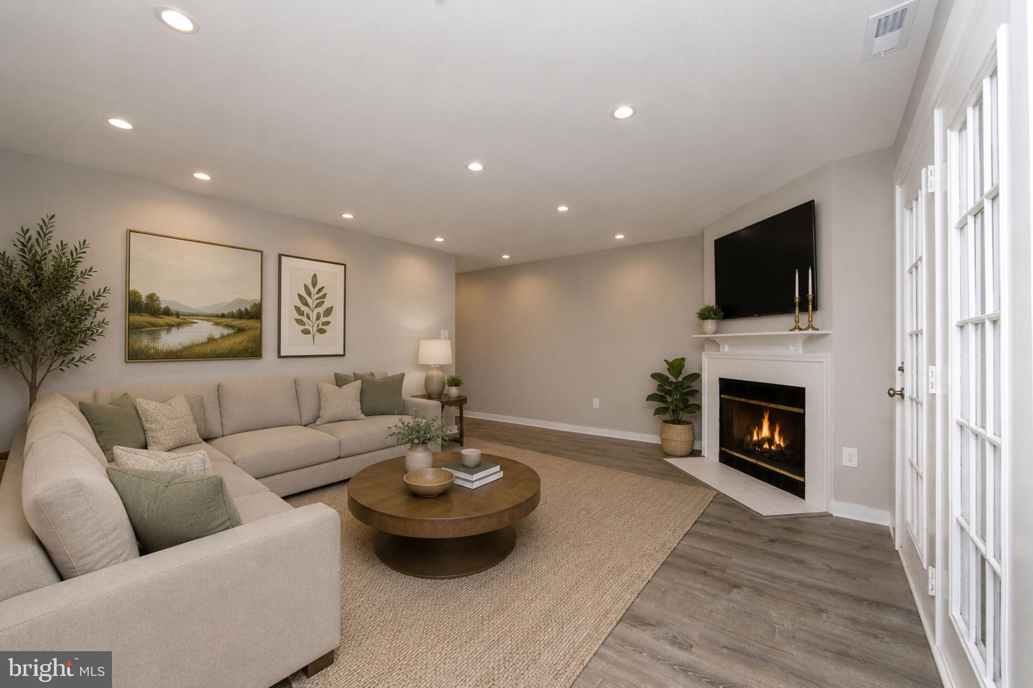 306 Tavistock Road Cherry Hill, NJ 08034 - Photo 10 of 33 Virtual staging of the great room view from kit.