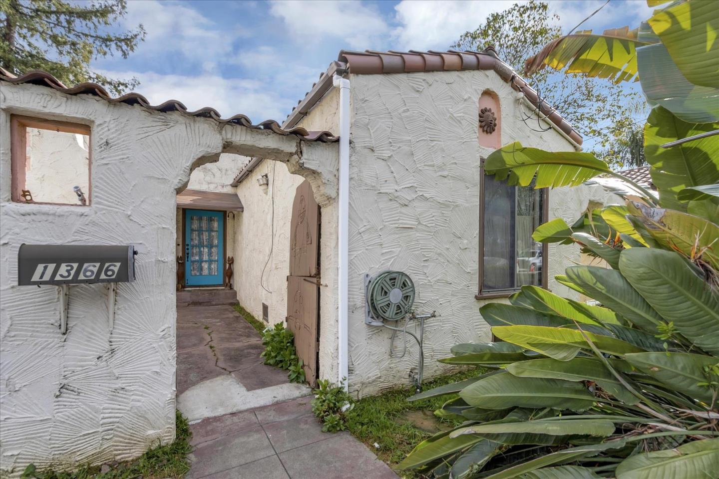 1366 Curtiss Avenue San Jose, CA 95125 - Photo 1 of 19 a front view of a house with outdoor space