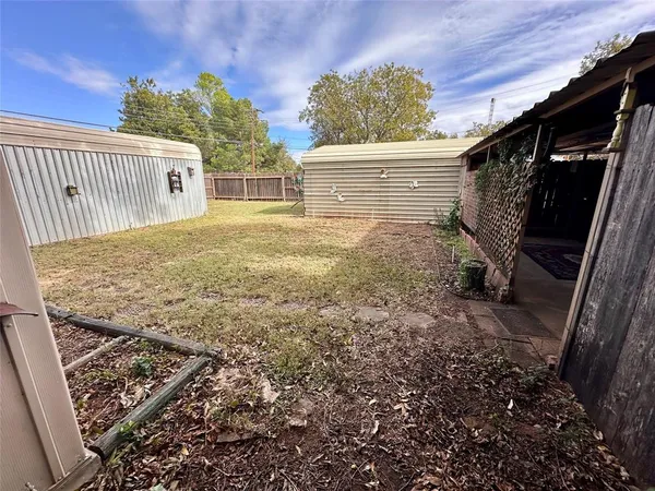 a view of backyard of house