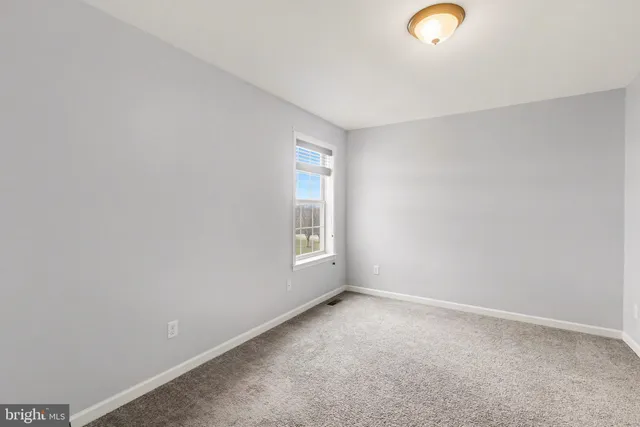 a view of empty room with window