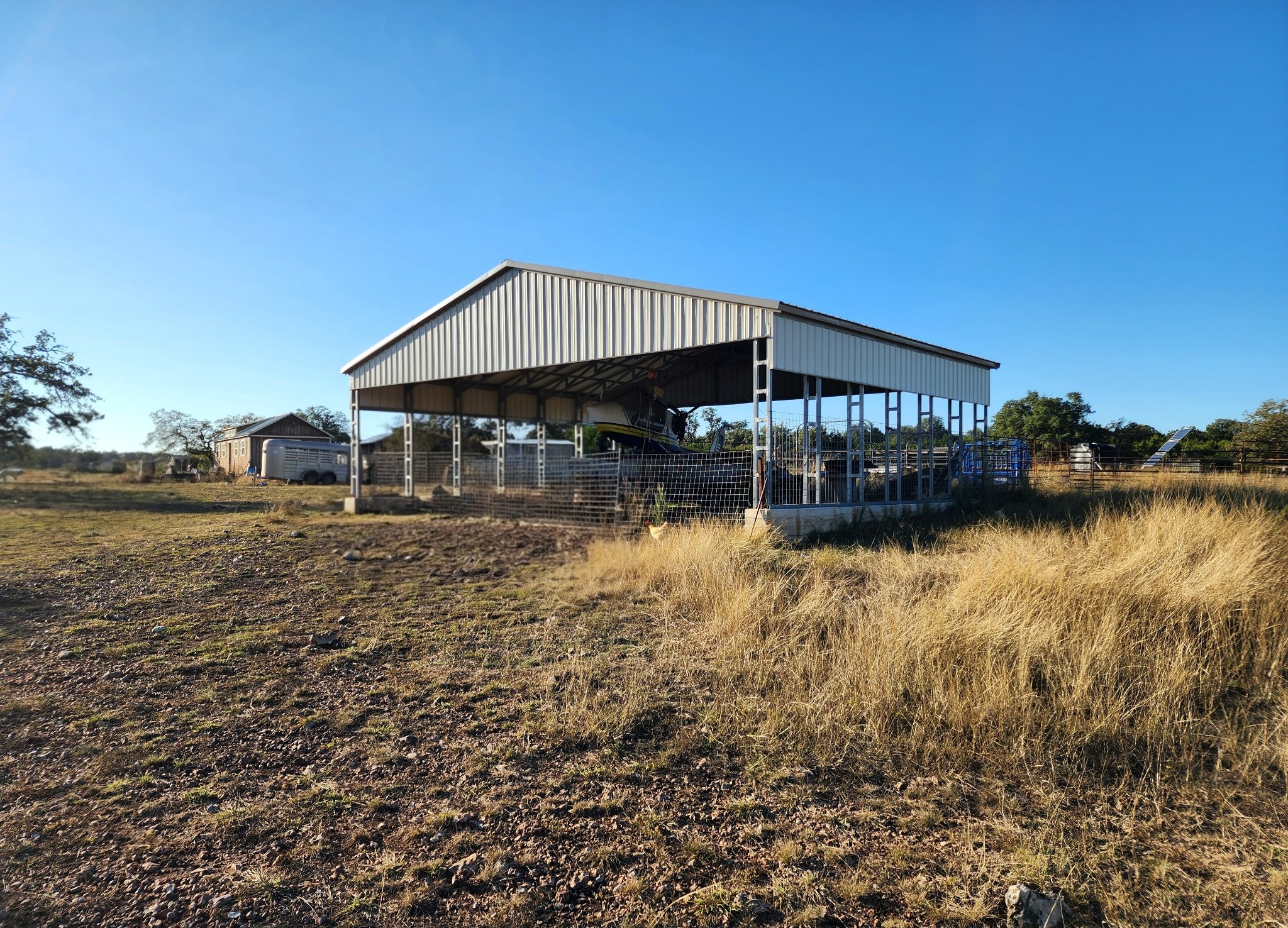 1332 Short Road Vanderpool, TX 78885 - Photo 29 of 44 a backyard of a house with lake view