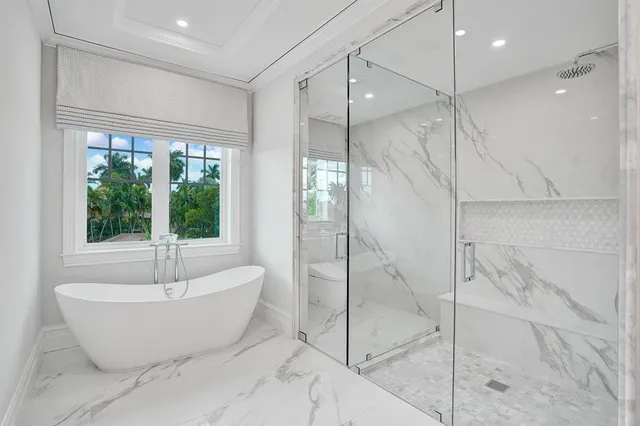 a view of a house with swimming pool and porch with furniture