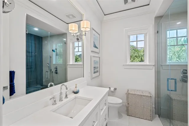 a view of a patio with a table chairs and a backyard