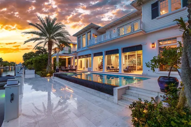 a kitchen with a sink and a large window