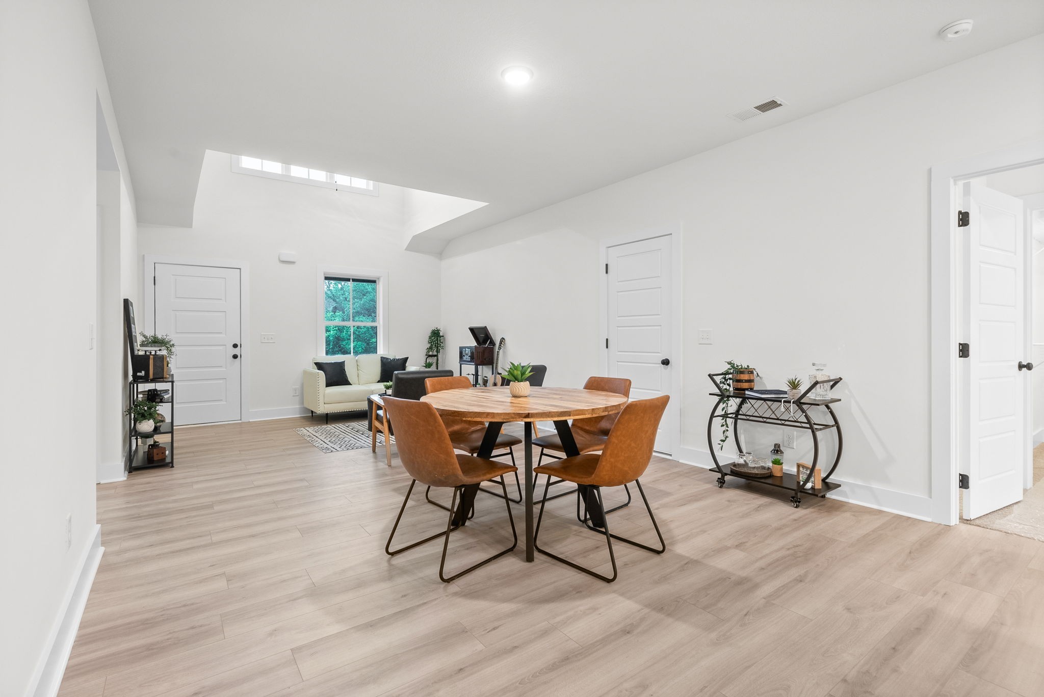 201 Dewberry Road Clarksville, TN 37042 - Photo 13 of 56 a view of a dining room with furniture and wooden floor