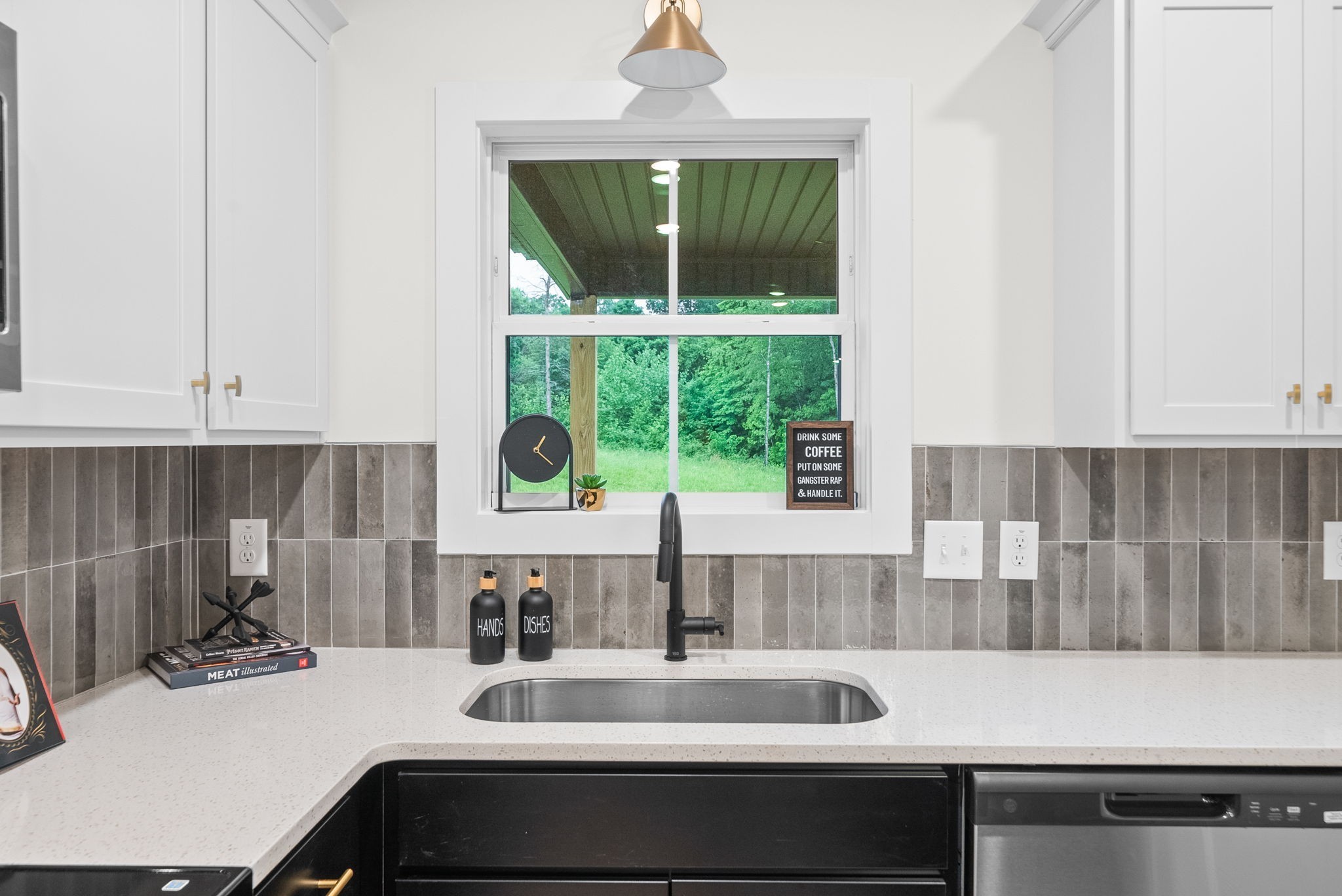 201 Dewberry Road Clarksville, TN 37042 - Photo 18 of 56 a kitchen with a sink and a large window