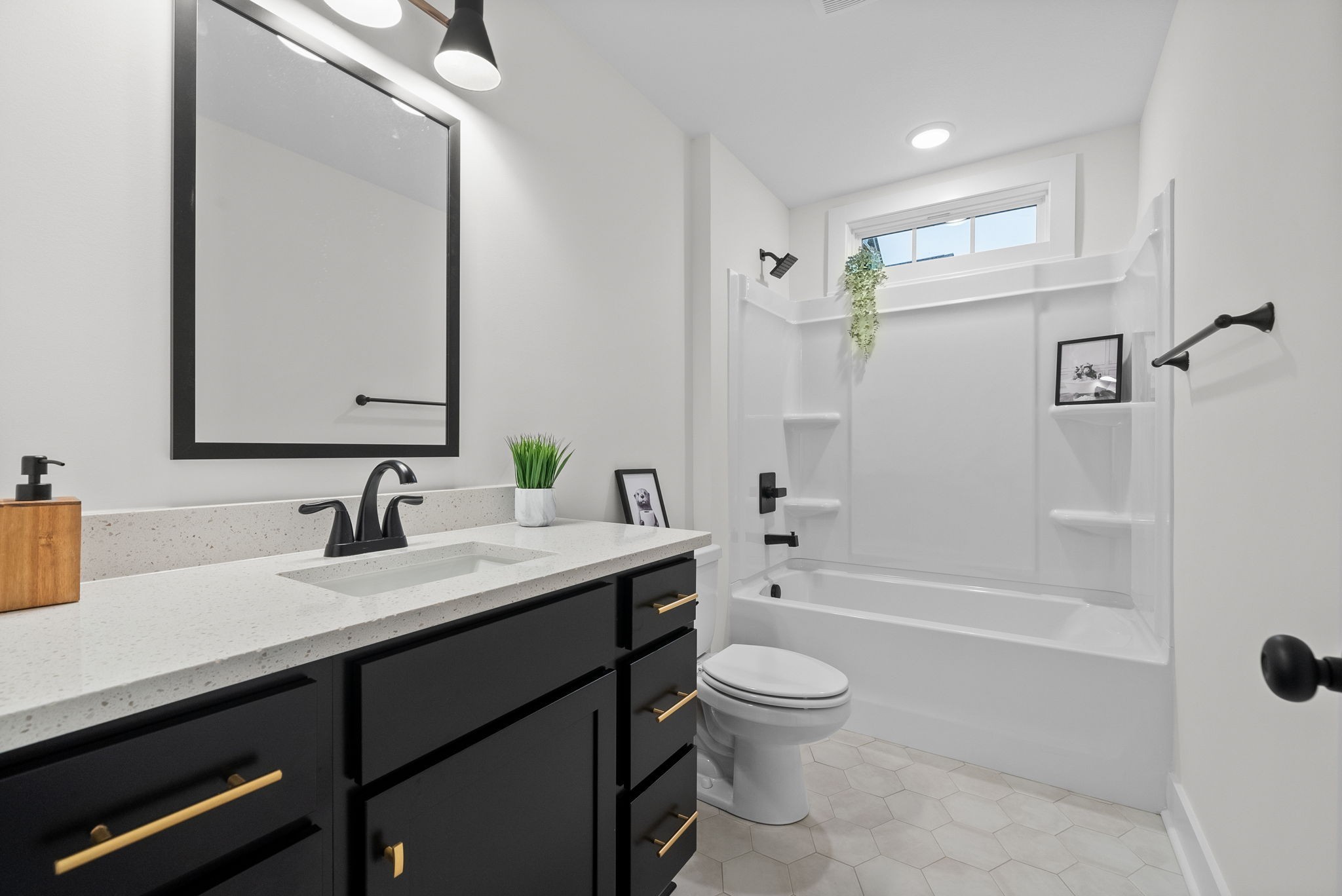 201 Dewberry Road Clarksville, TN 37042 - Photo 28 of 56 a bathroom with a bathtub shower sink vanity mirror and toilet