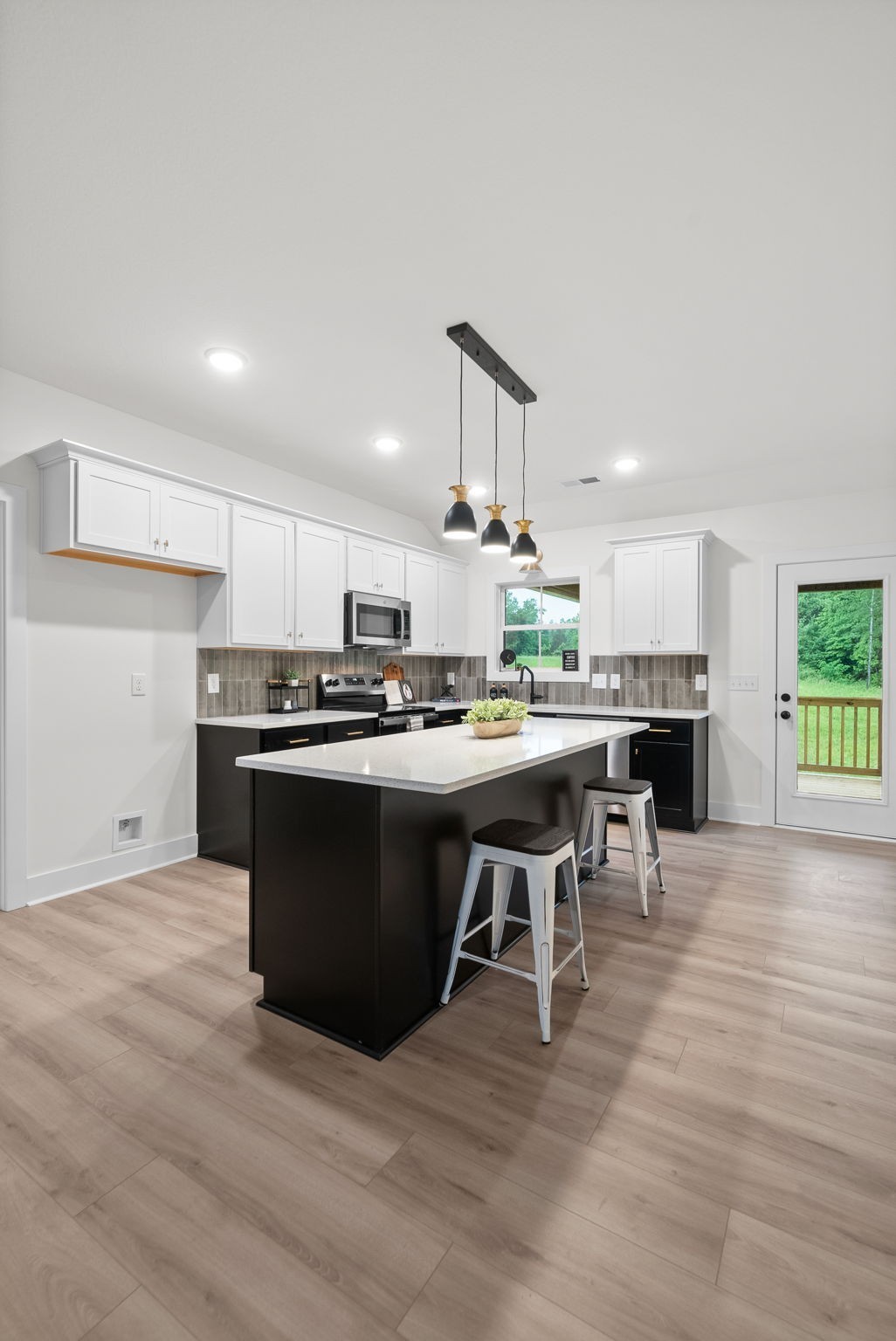 201 Dewberry Road Clarksville, TN 37042 - Photo 50 of 56 a kitchen with a sink cabinets and counter space