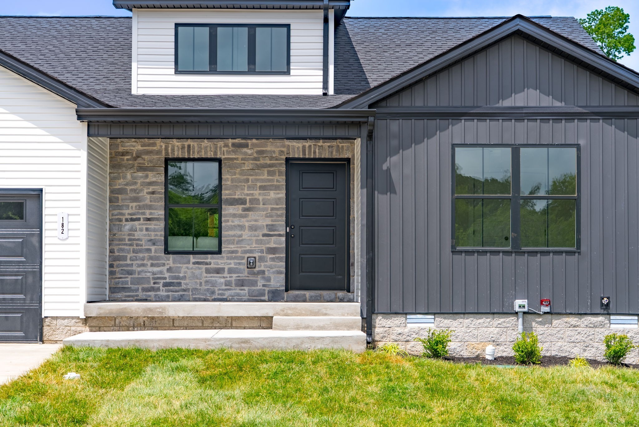 201 Dewberry Road Clarksville, TN 37042 - Photo 5 of 56 a front view of a house with garden