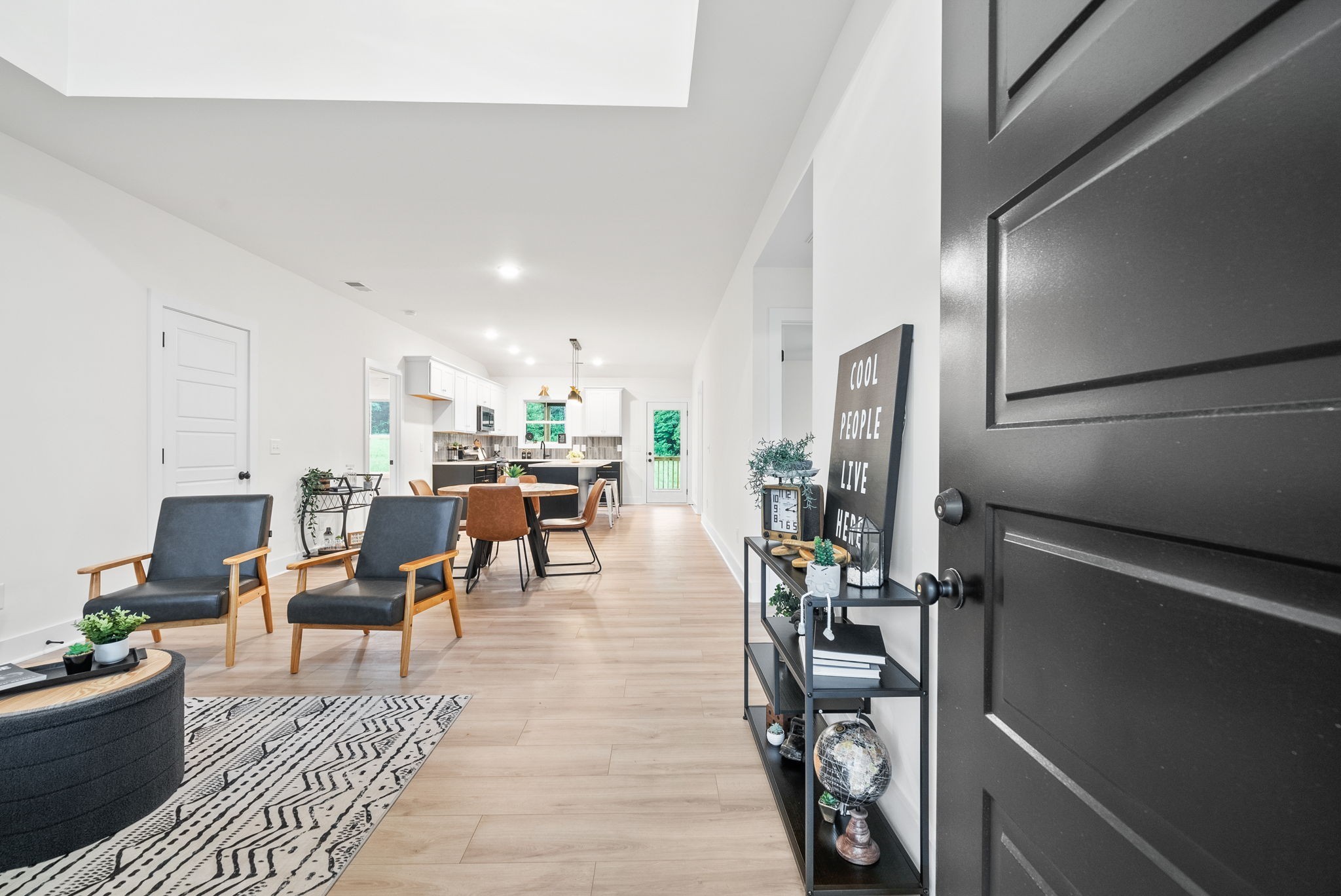 201 Dewberry Road Clarksville, TN 37042 - Photo 7 of 56 a living room with lots of furniture and kitchen view