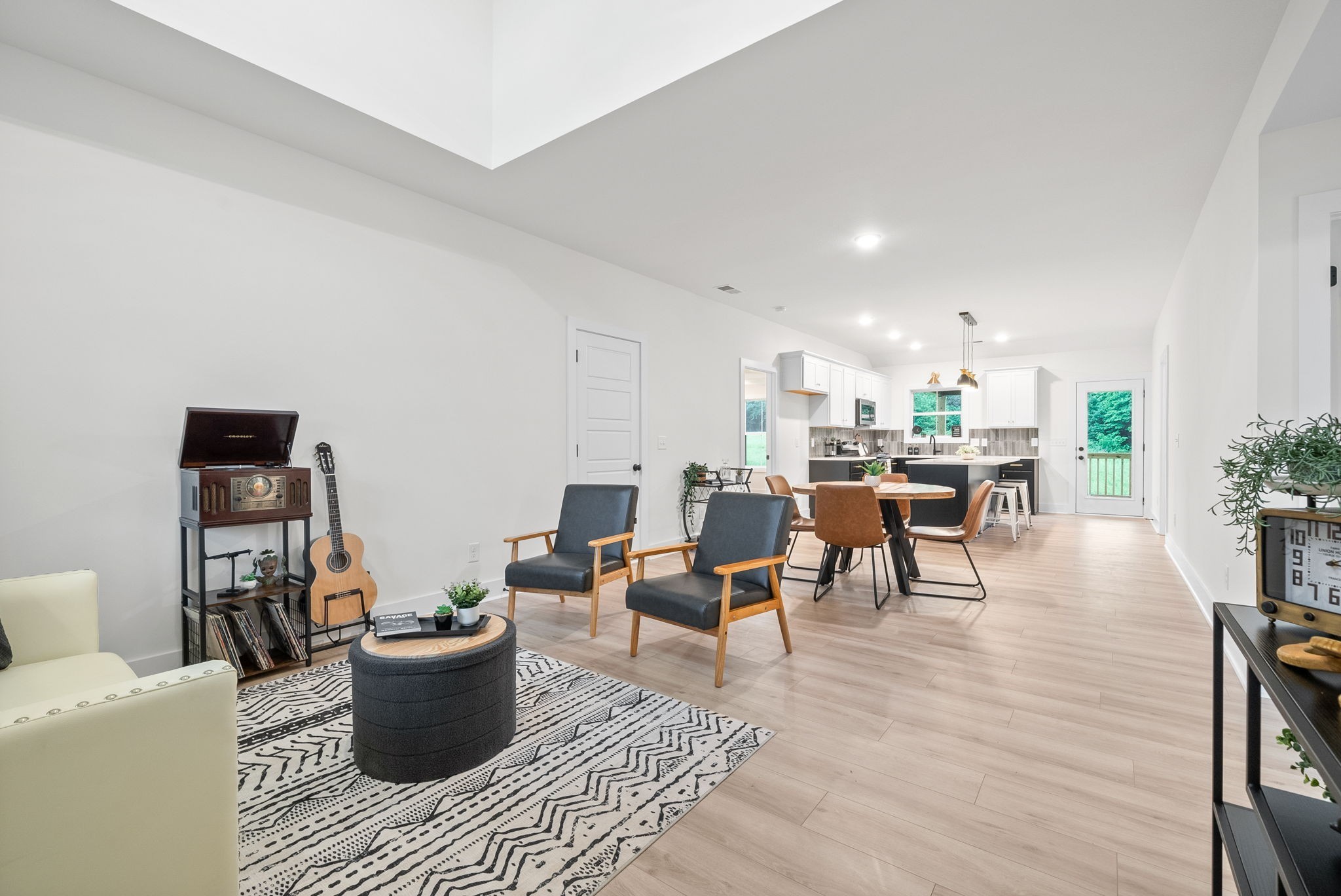 201 Dewberry Road Clarksville, TN 37042 - Photo 8 of 56 a living room with furniture a table and a potted plant