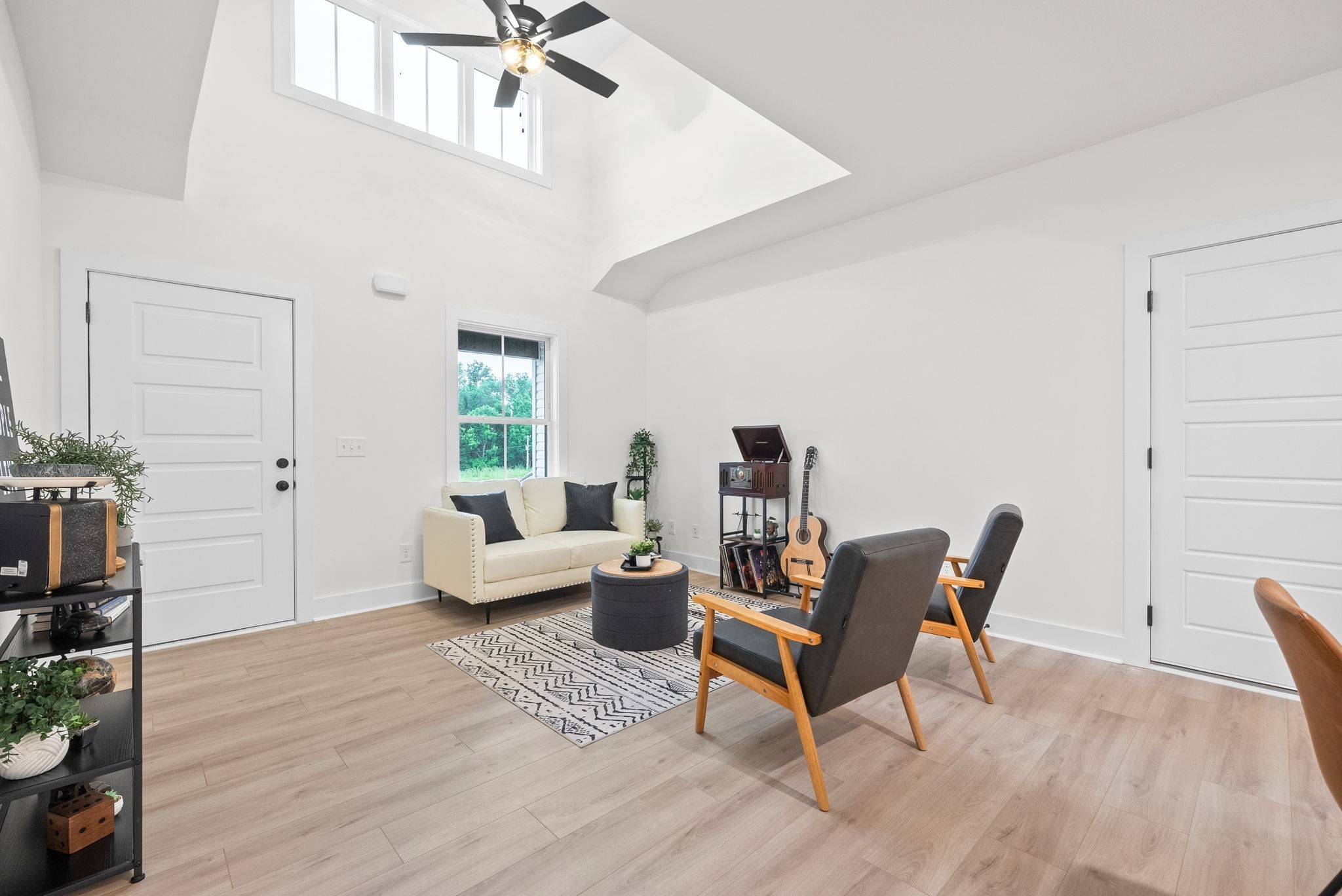 201 Dewberry Road Clarksville, TN 37042 - Photo 9 of 56 a living room with furniture and a wooden floor