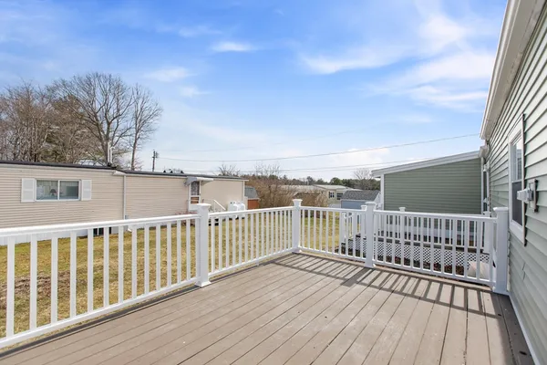 a view of a wooden roof deck