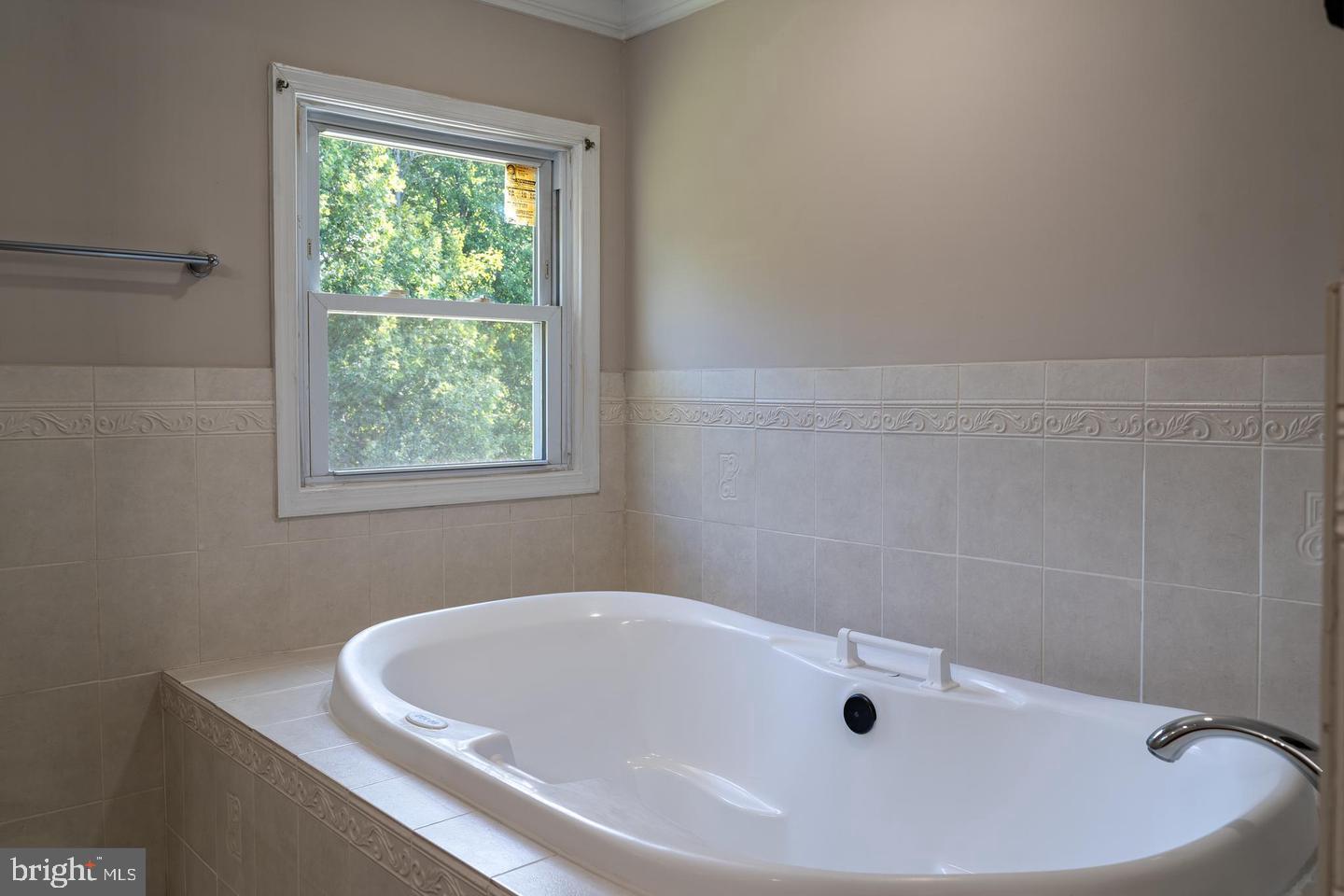14913 Lear Lane Silver Spring, MD 20905 - Photo 17 of 33 Serene bathroom with a soaking tub.