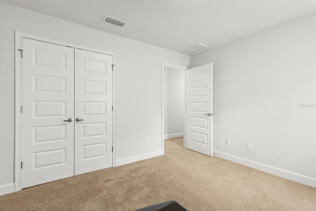 11042 Heth Court Weeki Wachee, FL 34613 - Photo 18 of 43 a view of an empty room