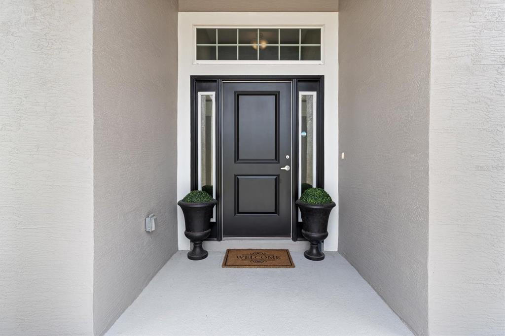 11042 Heth Court Weeki Wachee, FL 34613 - Photo 2 of 43 a view of front door of house