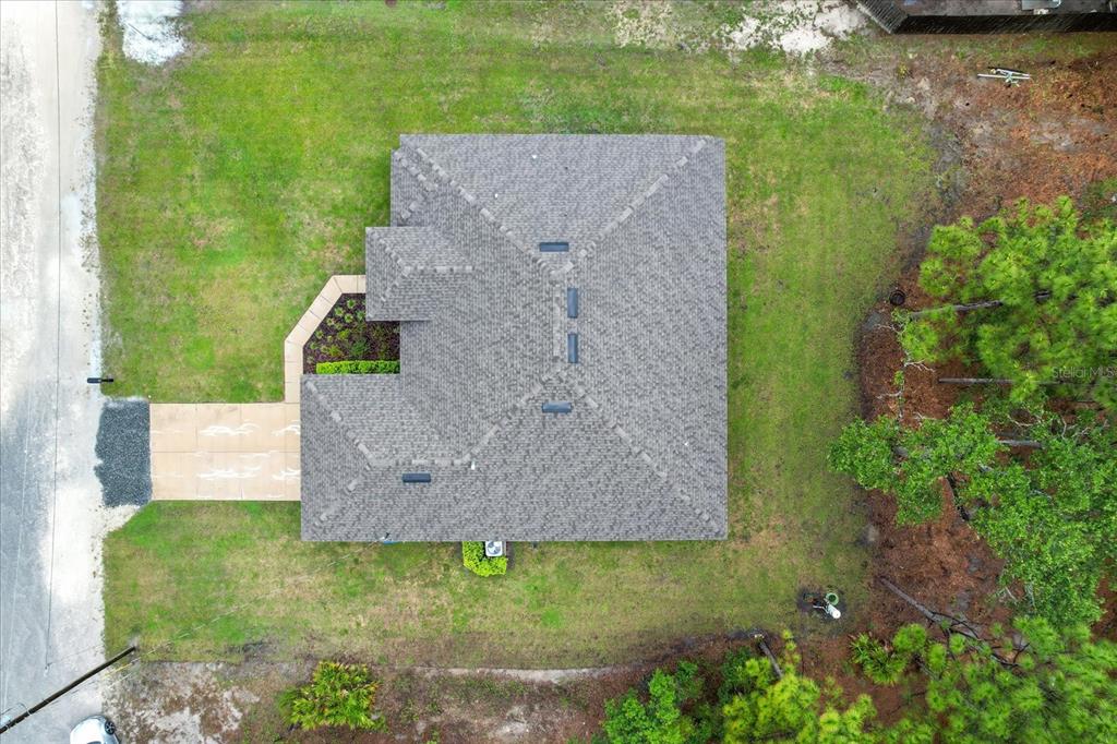 11042 Heth Court Weeki Wachee, FL 34613 - Photo 40 of 43 an aerial view of a house with a yard