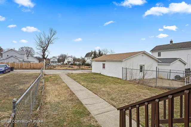 a view of a house with a patio