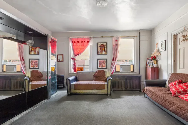 a kitchen with stainless steel appliances a sink and a refrigerator