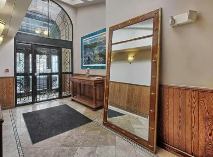 a view of a hallway with an entryway