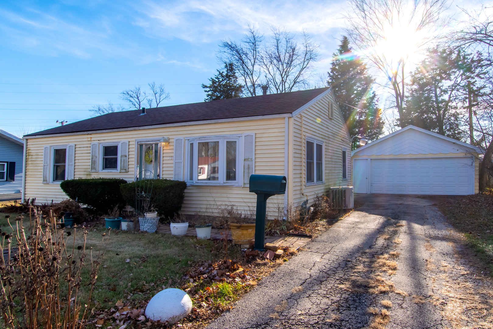306 Luana Road Joliet, IL 60433 - Photo 1 of 25 a view of a house with backyard and sitting area