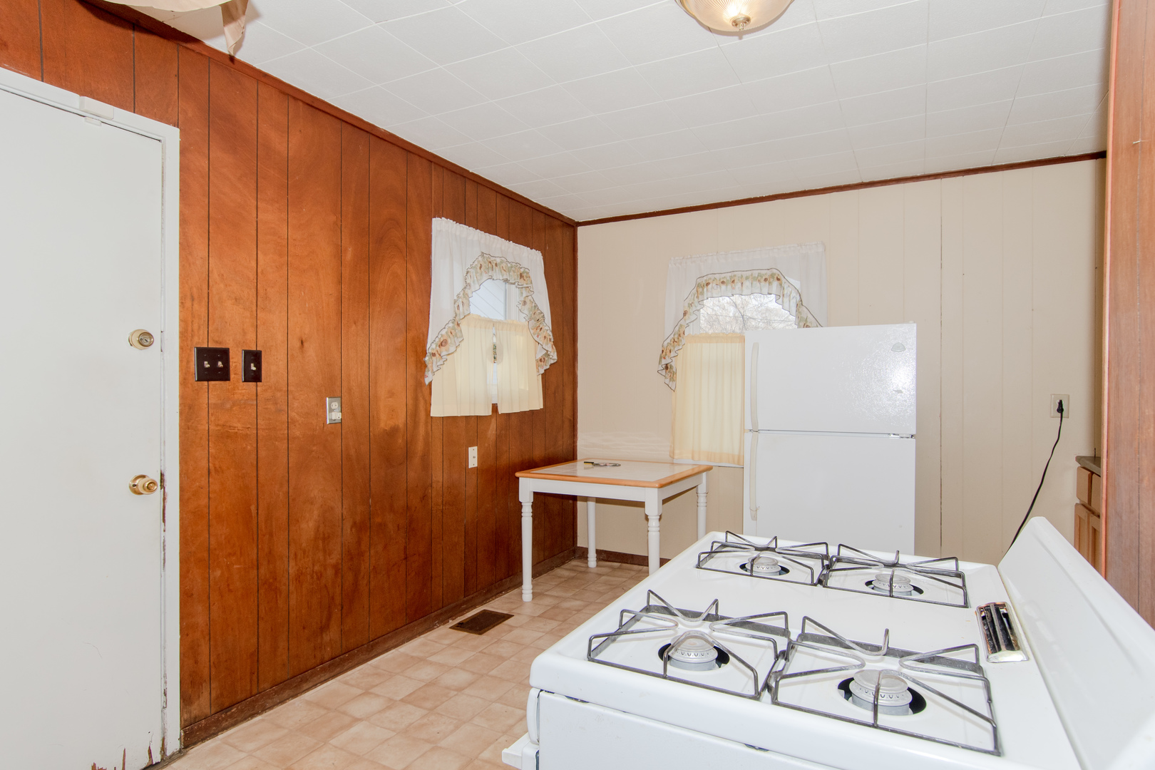 306 Luana Road Joliet, IL 60433 - Photo 14 of 25 a white bed sitting in a bathroom next to a window